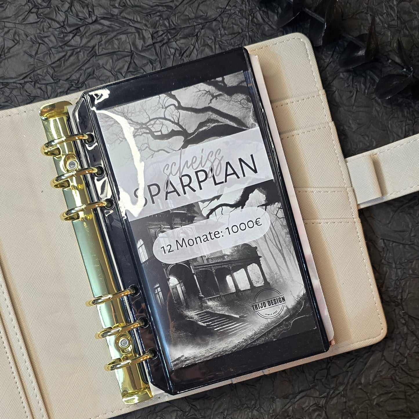 Sparplan 1000€ A6 Schwarz - "Scheiss Sparplan"